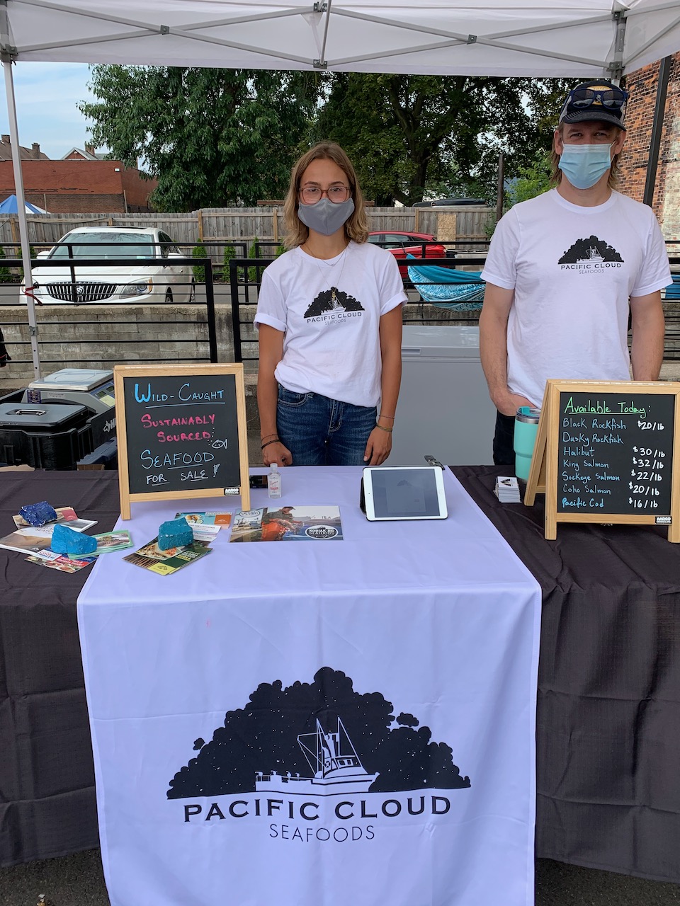 Grace and Ryan at a farmers market opening day
