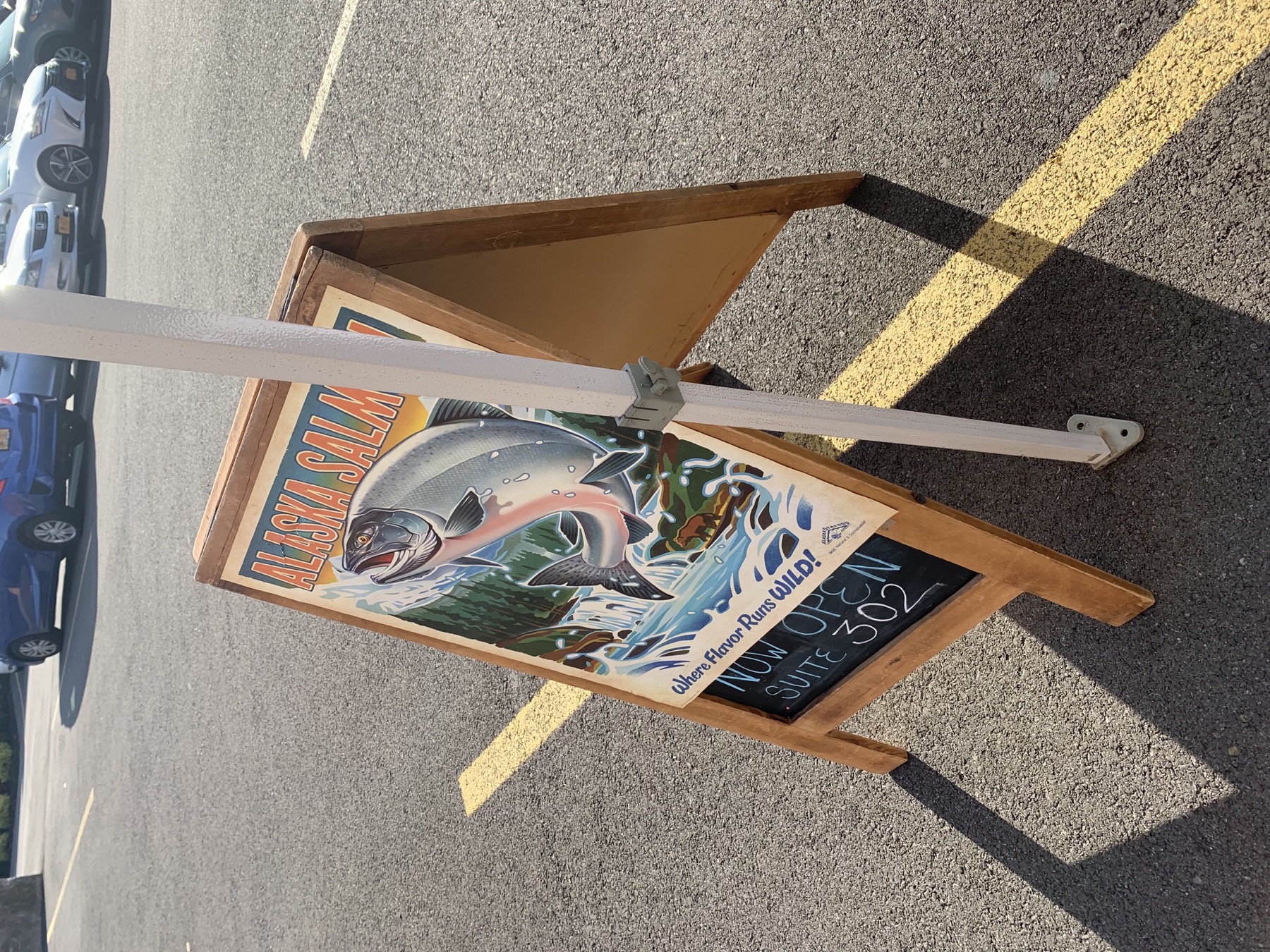 Pacific Cloud Seafoods chalkboard sign at a farmers market table