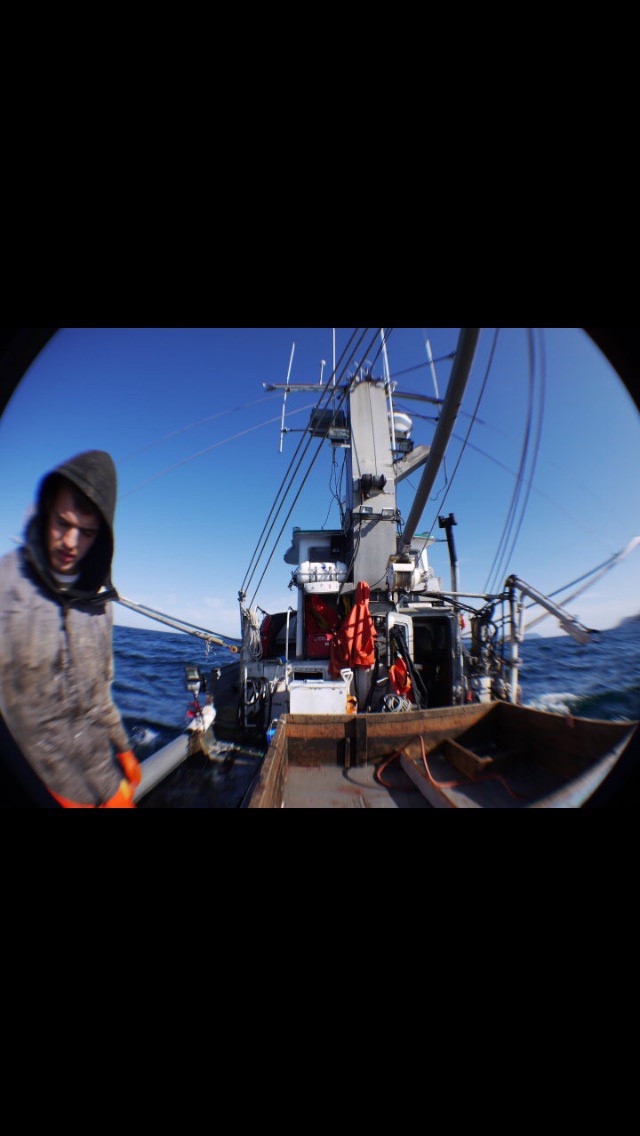 Fisherman working gear on deck